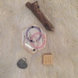 3 beautiful purple pink and clear Lokai braclets!